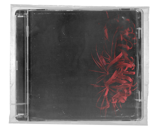 Transparent CD jewel case with a dark cover insert and red spider lily artwork along the right side.