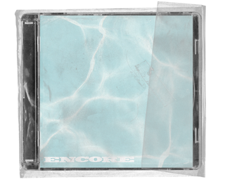 A plastic-wrapped CD jewel case. The cover is a pale aqua photograph of sunlight rippling across water, with ENCORE in white block capitals at the lower left and a strip of clear tape folded over the right edge.
