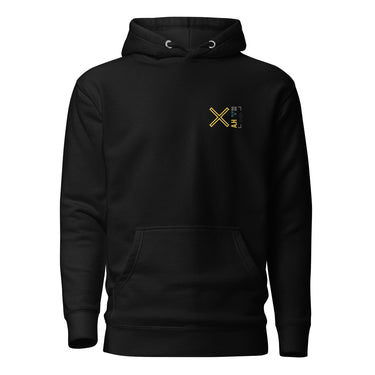 Front view of a solid-colored, hoodie. A small graphic on the left chest features a large, high-contrast 'X' symbol next to a small, vertical block of text and code-like characters.