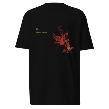 Front view of a solid-colored shirt. A graphic on the chest features a large, abstract, high-contrast shape resembling a flower, accompanied by several lines of handwritten-style script.