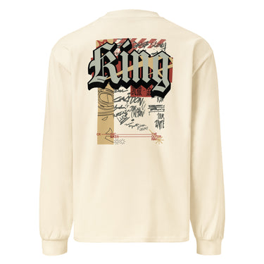 Back view of a solid-colored, longsleeve. A large, vertical collage graphic on the upper back features the word "King" in a bold, three-dimensional gothic font. The design is layered with a line drawing of an biker helmet, various handwritten signatures, and blocks of text.