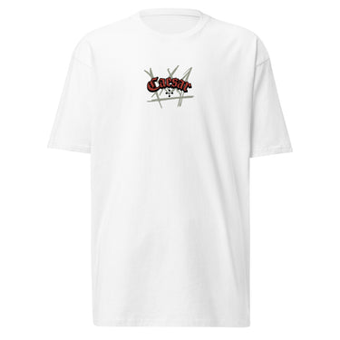 Front view of a solid-colored, shirt. A small graphic is centered on the chest, featuring the word "Caesar" in a stylized script font, layered over a background of sketchy, crisscrossing lines.