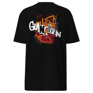 Back view of a solid-colored shirt. A large, chaotic collage graphic on the upper back features stylized text, graffiti scribbles, and abstract textured shapes.