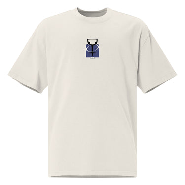 The front of a faded bone oversized tee. Centered on the chest is a small graphic featuring a stylized black symbol, resembling a chalice, set against a blue rectangular background.