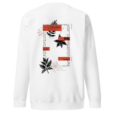 Back view of a solid-colored sweatshirt. A large, vertical collage graphic on the upper back is framed by columns of text. The design features high-contrast botanical illustrations, East Asian characters, and blocks of handwritten script.