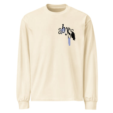 Front view of a longsleeve. A small graphic on the left chest features the word "abyss" in a black script font, layered over abstract streaks of periwinkle blue and distorted black shapes.