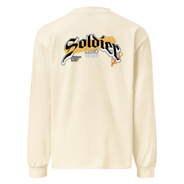 Back view of a solid-colored, longsleeve. A large, horizontal graphic on the upper back features the word "Soldier" in a high-contrast, stylized script font. This is layered over a wide brushstroke shape and several smaller blocks of text, and san serif text featuring the word “Zero”