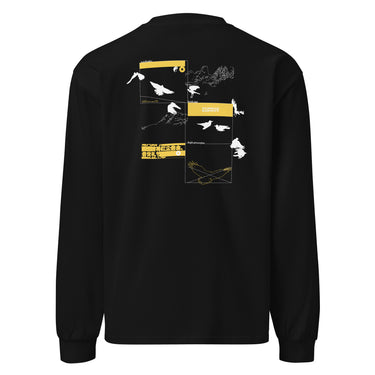 Back view of a longsleeve. A large collage graphic is arranged in a grid of rectangular frames. The design features multiple high-contrast silhouettes of birds in flight, a topographical map-like shape, and several small blocks of text and abstract symbols.