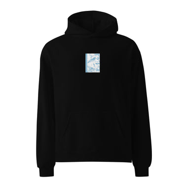 Front view of an oversized hoodie in black. Design is a bitmapped illustration of Seed from Zenless Zone Zero, in a small centered rectangular graphic on the chest. The graphic is composed of light tones.