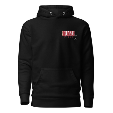 A black hoodie with an off centered graphic to the left side of the sweatshirt. The design features the word 'THYME' in a large, white font layered over a red rectangle accompanied by red text depicting "FIELD" underneath it.