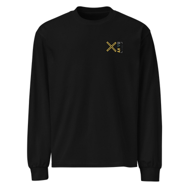 Front view of a solid-colored, longsleeve. A small graphic on the left chest features a large, high-contrast 'X' symbol next to a small, vertical block of text and code-like characters.