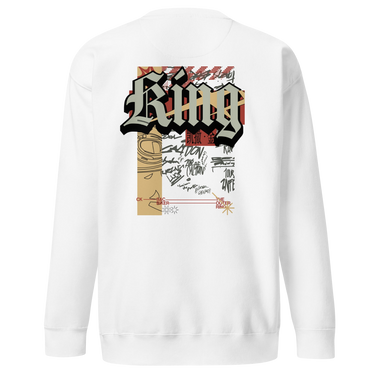 Back view of a solid-colored, sweatshirt. A large, vertical collage graphic on the upper back features the word "King" in a bold, three-dimensional gothic font. The design is layered with a line drawing of an biker helmet, various handwritten signatures, and blocks of text.