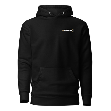 Front view of an hoodie in black. A minimalist design placed on the upper left chest shows a compact arrangement of small graphic elements, including a circular icon, the word “KRAMPUS” in bold, and a narrow vertical block with stylized symbols.