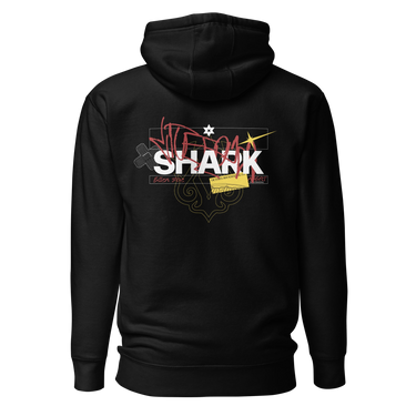 Back view of a solid-colored hoodie. A large, chaotic collage graphic on the upper back features the word "SHARK" in a bold font. The design is layered with various handwritten signatures, sketchy scribbles, and abstract background patterns.