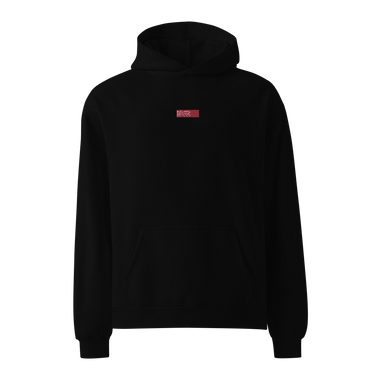 Front view of an oversized hoodie in black. Design is a small, embroidered red patch on the left chest featuring the white line art of an Astral Express ticket from Honkai: Star Rail.