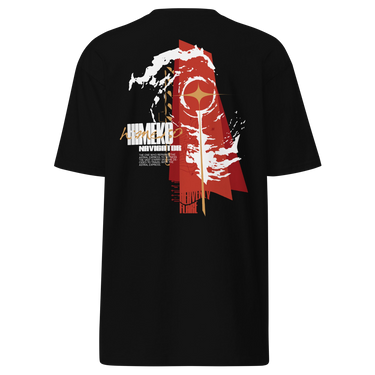 Back view of a T-Shirt in Black. a large back graphic centered on a jagged, torn-map style emblem in white with a glowing star burst at its center, layered over angled orange-red geometric panels resembling sail or flag fragments, alongside a bold two-line wordmark, a short block of descriptive text, and a smaller diagonal wordmark near the hem