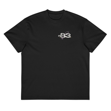 Front view of a box tee in black, flat. A small graphic on the left chest features the number "