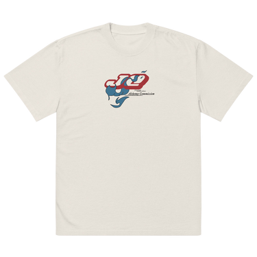 Front view of a solid-colored oversized-tee. A graphic on the chest features the characters "JQ" in a stylized, high-contrast font, intertwined with a flowing, smoke-like shape. Below is the text "Alchemy Commission".