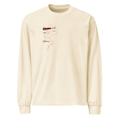 Front view of a solid-colored longsleeve. A small graphic on the left chest features a fine-line illustration resembling a smoke outline, with several blocks of technical-style text labeling different areas.