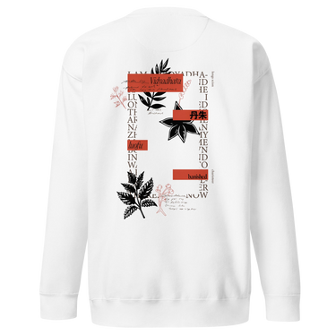 Back view of a solid-colored sweatshirt. A large, vertical collage graphic on the upper back is framed by columns of text. The design features high-contrast botanical illustrations, East Asian characters, and blocks of handwritten script.