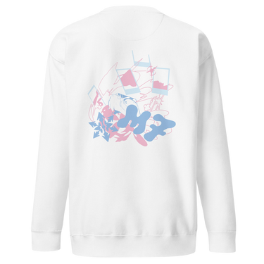 Back view of a solid-colored sweatshirt. A large, playful collage graphic is centered on the back. It features large, abstract blob-like letterforms, line drawings of polaroid frames, and various high-contrast scribbles and floral shapes.