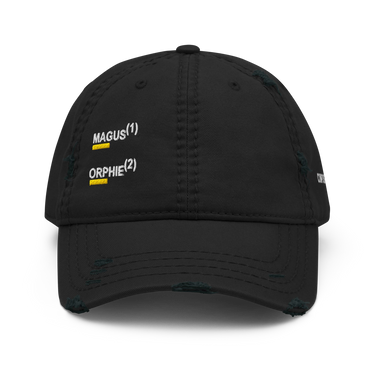 Black distressed baseball cap, front view, showing embroidered white text 'MAGUS(1)' and 'ORPHIE(2)' stacked vertically with bold yellow underlines, visible distressed details on brim and panels.