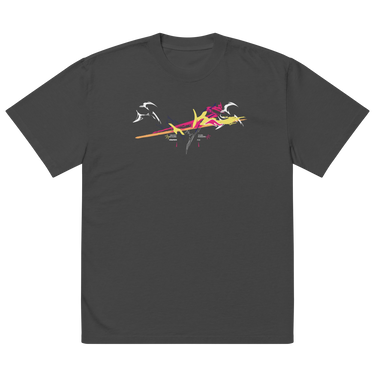 Front view of a solid-colored oversized-tee. A large, dynamic graphic across the chest features a chaotic collage of high-contrast brush strokes, sharp angular forms, and silhouettes resembling swooping birds.