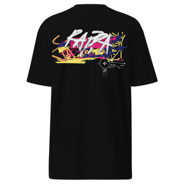 Back view of a solid-colored shirt. A large, horizontal graphic on the upper back features a stylized, graffiti-like word spelling “RAPPA” layered over a wide smear of high-contrast brush strokes imitating graffiti splatter. To the side are smaller, schematic graphics including a compass rose and blocks of text.