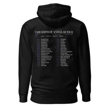 Back view of a hoodie in black. A large graphic fills the upper back, laid out like a concert tour poster. A wide display serif title reads "VARIATIONS OF A STELLAR TOUR" in white, with a small italic "robin" and "/summeretto" tucked beneath it and a ruled row of four era markers below that. Two columns of dated stops run down the rest in condensed capitals, the dates set in violet, with thin outlined starbursts drifting across the list.