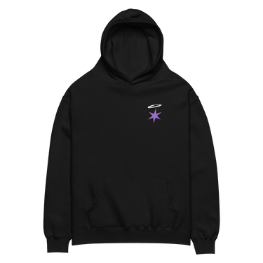 Front view of an oversized hoodie in black. A small graphic sits high on the left chest: a loose, hand-drawn halo ring in white tilted above a sharp six-pointed star in soft violet. Both shapes print flat, the ring's brushed edges left rough and unfinished.