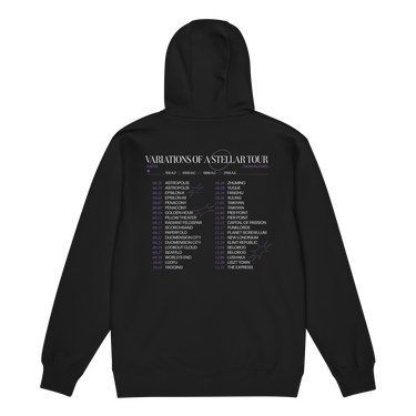 Back view of a zip hoodie in black. A large graphic fills the upper back, laid out like a concert tour poster. A wide display serif title reads "VARIATIONS OF A STELLAR TOUR" in white, with a small italic "robin" and "/summeretto" tucked beneath it and a ruled row of four era markers below that. Two columns of dated stops run down the rest in condensed capitals, the dates set in violet, with thin outlined starbursts drifting across the list.