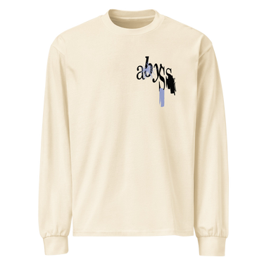 Front view of a longsleeve. A small graphic on the left chest features the word "abyss" in a black script font, layered over abstract streaks of periwinkle blue and distorted black shapes.