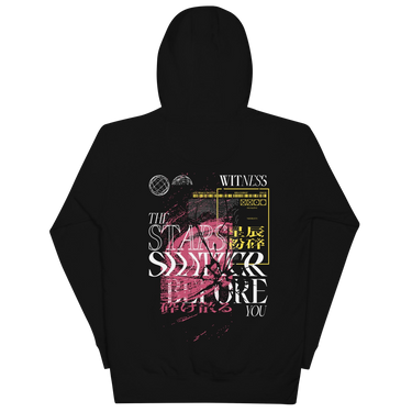 Back view of a solid-colored hoodie. A large, complex collage graphic on the upper back features the text "THE STARS SHATTER BEFORE YOU" in a distressed style. The design is layered with abstract textures, barcodes, wireframe globes, and a web of lines creating a shattered glass effect.