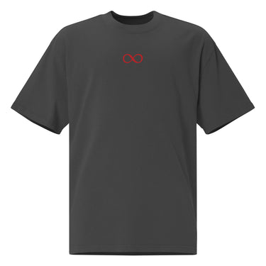 Front view of a oversized tee in faded black. A small red infinity-loop motif sits at the center chest as the only graphic — minimalist and restrained, with bold color contrast against the washed fabric.