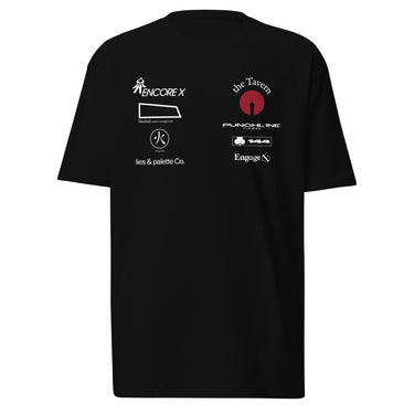 Front view of a tee in black. A graphic-forward arrangement of stylized sponsor-style logos fills the upper chest in two columns — featuring marks reading "ENCORE X," "the Tavern," "PUNCHLINE Tuning," "blocked. media management," "lies & palette Co.," "144," and "Engage," alongside a circular flame emblem. White and deep crimson lettering on black, blending streetwear with motorsport aesthetics.