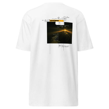 Back view of an t-shirt in white. Design shows a rectangular grayscale graphic centered on the upper back showing a lighthouse shining into darkness. Above the image is a yellow label reading “LIGHTKEEPER,” surrounded by thin white grid lines and handwritten script text for a technical, conceptual design aesthetic