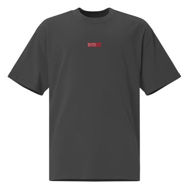 Front view of an oversized tee in black. Design is a small, embroidered red patch on the left chest featuring the white line art of an Astral Express ticket from Honkai: Star Rail.