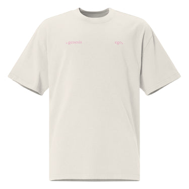 Front view of an oversized tee in faded bone. Design features small text printed across the upper chest: the word ‘genesis’ on the left side, preceded by a circular symbol, and the word ‘ego’ on the right side preceded by a music note.