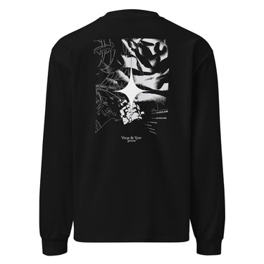 Back view of an longsleeve in black. The design showcases a large, intricate graphic centered on the upper back. A radiant, four-point star form sits in the middle, surrounded by fragmented abstract shapes, and faint technical linework. Scattered numbers and coordinates appear along the right side, adding a coded, data-driven atmosphere. At the bottom of the composition, serif text reads “Verse & Vow,” followed by the word “genesis” in delicate handwritten script.