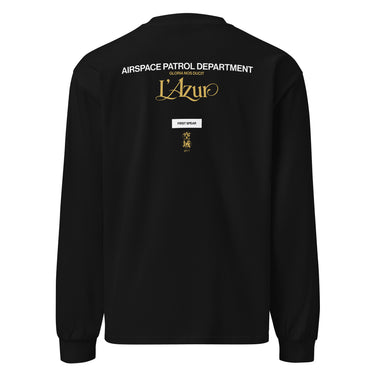 Back view of a longsleeve in Black. A stacked graphic fills the upper back: "AIRSPACE PATROL DEPARTMENT" in heavy white capitals, "GLORIA NOS DUCIT" in smaller gold capitals beneath it, then "L'Azur" in a large gold script with a long trailing flourish. Below sit a small white box lettered "FIRST SPEAR" in black, a weathered gold seal stamp carrying two characters, and "gen 5" in gold.