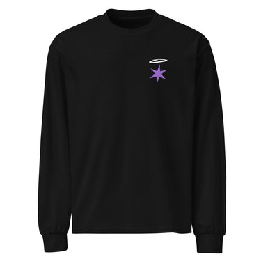 Front view of a longsleeve in black. A small graphic sits high on the left chest: a loose, hand-drawn halo ring in white tilted above a sharp six-pointed star in soft violet. Both shapes print flat, the ring's brushed edges left rough and unfinished.