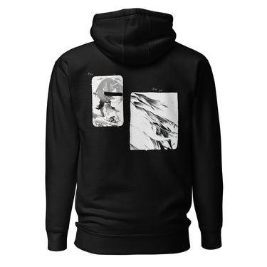 Back view of a hoodie in black. A large two-panel composition fills the back. On the left, a halftoned portrait with a solid black bar across the eyes; to the right, a wider panel of sweeping feathers in heavy contrast. The words "pas" and "d'aveu" float above them in a fine serif, the letters spaced apart and drifting.