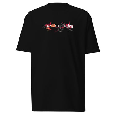 Front view of a solid-colored shirt. A graphic centered on the chest features the letters of the word "SPARKLE" stylized and scattered among abstract shapes, a line drawing of a mask, and small blocks of text.