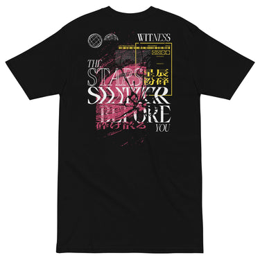 Back view of a solid-colored shirt. A large, complex collage graphic on the upper back features the text "THE STARS SHATTER BEFORE YOU" in a distressed style. The design is layered with abstract textures, barcodes, wireframe globes, and a web of lines creating a shattered glass effect.
