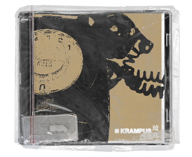CD jewel case in clear shrink wrap. The cover shows a pixelated black bear with open jaws beside a beige rotary telephone dial, with the 'KRAMPUS' logo in the lower right and a silver security tag in the lower corner.