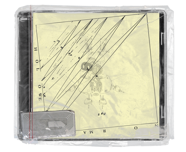 CD jewel case in clear shrink wrap. The cover is pale yellow with a technical diagram of a small exploded robotic figure crossed by long ruled lines, spaced-out capital letters along its edges, and a silver security tag in the lower corner.