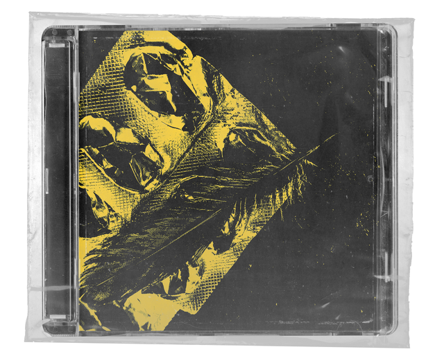 CD jewel case in clear shrink wrap. The cover shows a black feather laid across crumpled foil, printed in yellow on black inside a tilted square.