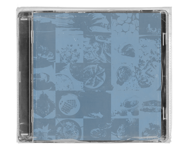 CD jewel case in clear shrink wrap. The cover is a dusty-blue grid of single-tone photographs of food, including dumplings, waffles, pastries and plated dishes.