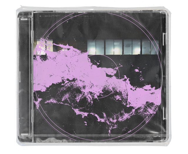 CD jewel case in clear shrink wrap. The cover is black with a lilac paint-splatter shape across the middle, a band of lit office windows above it, and thin lilac concentric circles.