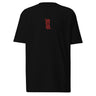 Front view of a solid-colored shirt. An embroidered graphic is centered on the chest, featuring two large East Asian characters stacked vertically, rendered with a high-contrast, sketchy texture. The characters spell out “Acheron”.